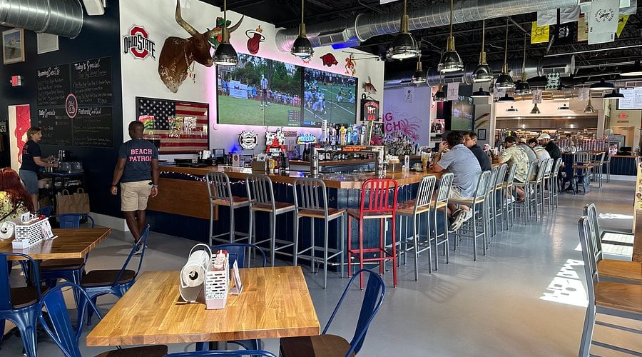 Pig Beach BBQ Palm Beach — smoked meats, craft cocktails, and outdoor dining on South Dixie Highway